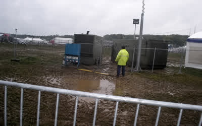 A dated low-resolution outdoor generator compound photograph.